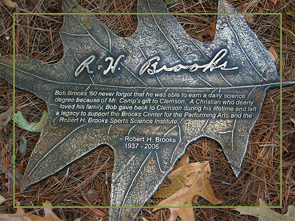 Bronze oak leaf in honor of Robert H. Brooks.